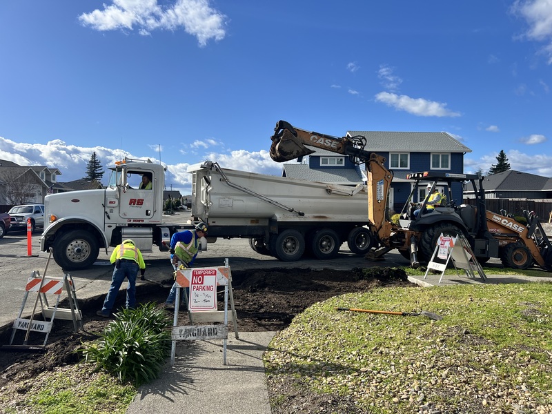 Removing one of the existing pedestrian curb ramps
