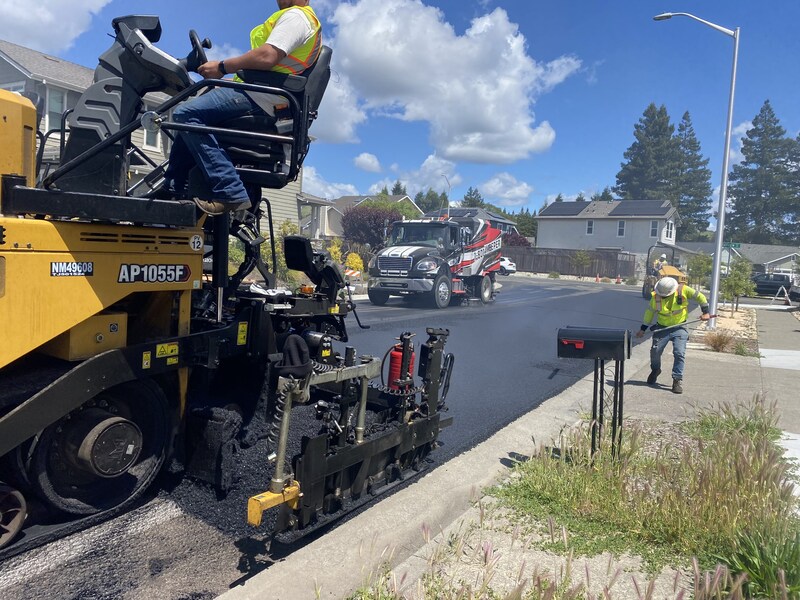 Laying asphalt for the new road surface