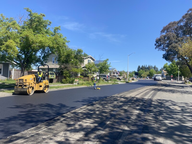 Performing compaction testing on the newly installed asphalt